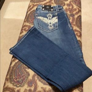 Miss Me Jeans with Winged Cross on Back Pocket